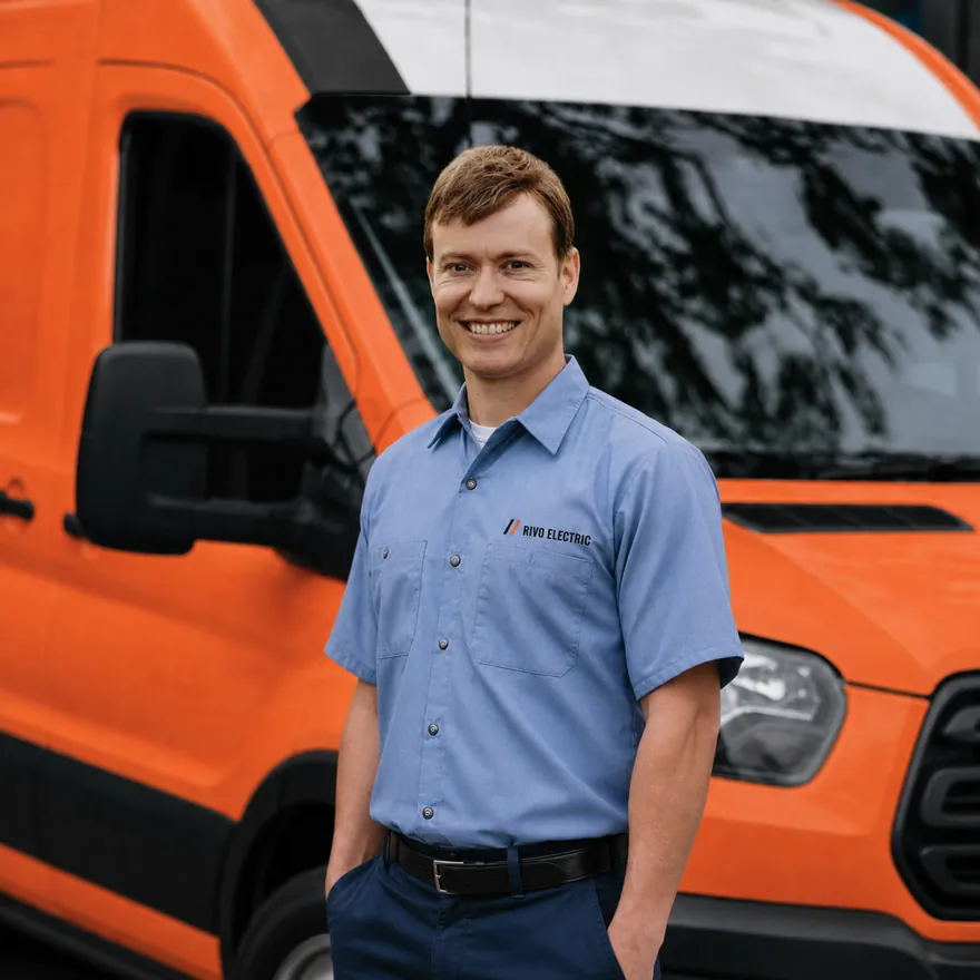 Rivo technician in front of the van
